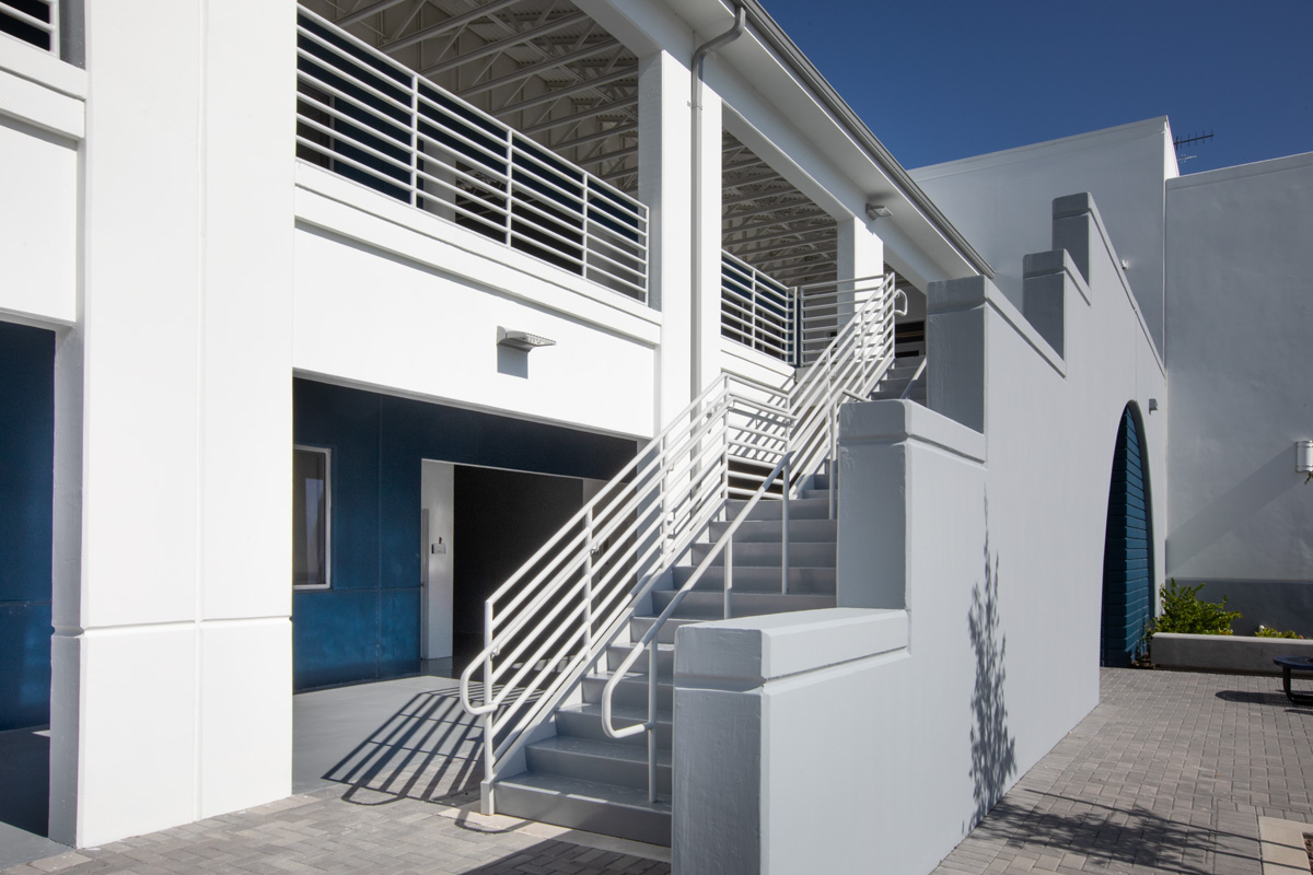 Architectural view of the courtyard staircase at Pinecrest prep charter k-12 school in Miami.